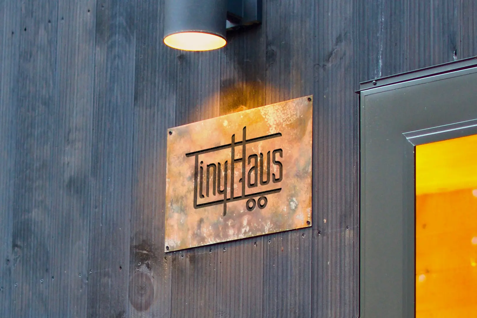 TinyHaus logo on copper placard